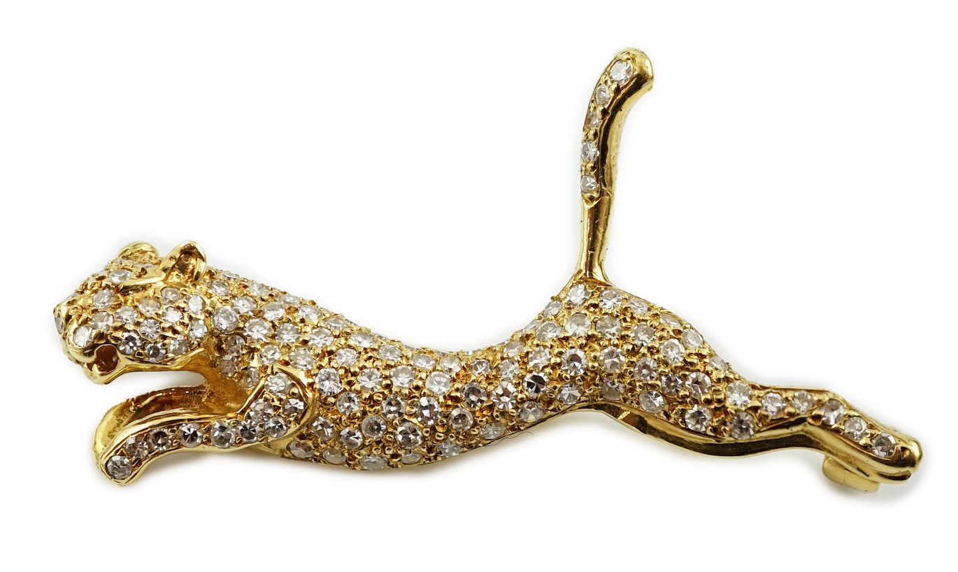 A gold and pave set diamond leaping panther brooch
